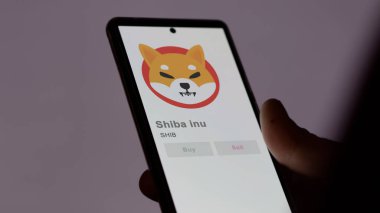 SHIB shiba inu crypto varlığının logosunu bir değiş tokuş ekranında kapat. SHIB shiba inu fiyat hisseleri, bir aygıt için SHIB $.