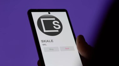 Bir değiş tokuş ekranındaki SKL SKALE şifreleme varlığının logosunu kapat. SKL SKALE fiyat hisseleri, bir aygıtta $SKL.