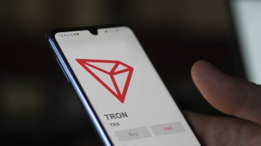 TRX TRON şifreleme varlığının logosunu bir değiş tokuş ekranında kapat. TRX TRON fiyat hisseleri, bir aygıt üzerinde $TRX.