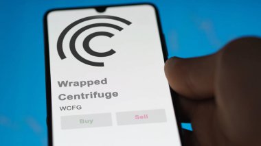 WCFG ambalajlı santrifüj şifreleme varlığının logosunu bir takas ekranında kapat. WCFG Paketlenmiş Santrifüj Fiyat Hisseleri, Bir aygıt üzerinde $WCFG.