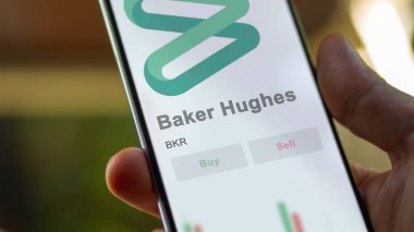 Houston, Teksas. Takas ekranındaki Baker Hughes logosuna yaklaş. Baker Hughes hisse senetleri, bir cihazda BKR $.