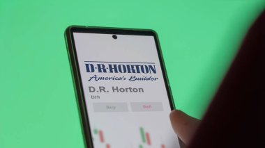 Arlington, Teksas. D.R. logosunu kapat. Horton bir değiş tokuş ekranında. D R Horton hisse senetleri, DHI $bir aygıt üzerinde.