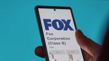 New York, New York. Fox Corporation 'ın (B sınıfı) logosuna bir takas ekranında yaklaş. Fox Corporation (B sınıfı) fiyat hisseleri, bir aygıt üzerinde FOX $.
