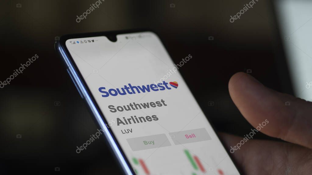 Dallas, Texas. Close up on logo of Southwest Airlines on the screen of an exchange. Southwest Airlines price stocks, $LUV on a device.