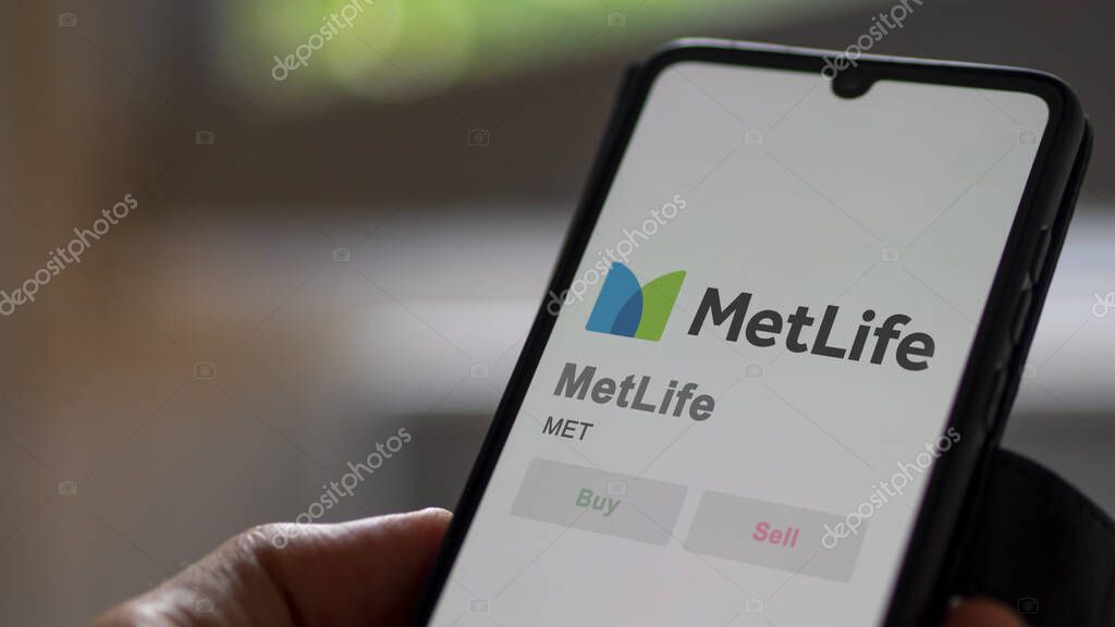 New York City, New York. Close up on logo of MetLife on the screen of an exchange. MetLife price stocks, $MET on a device.