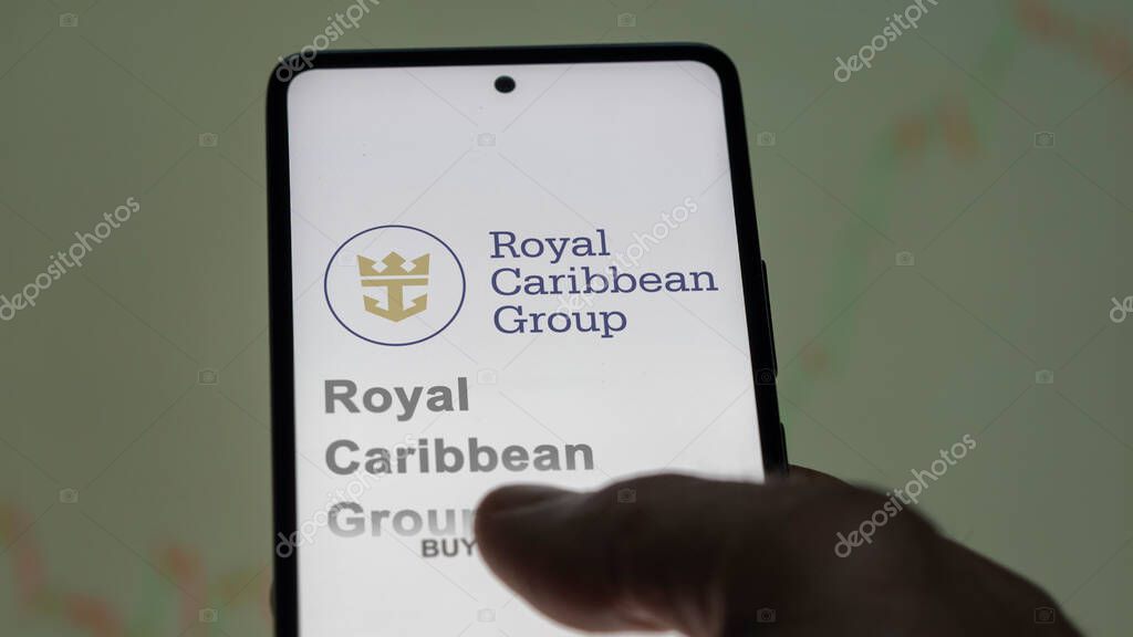 Miami, Florida. Close up on logo of Royal Caribbean Group on the screen of an exchange. Royal Caribbean Group price stocks, $RCL on a device.