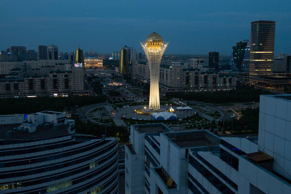  Astana, Kazakhstan 09.07.2018 :  the city center, Nurzhol Boulevard and Bayterek Tower are illuminated at night, top view,Astana,Kazakhstan