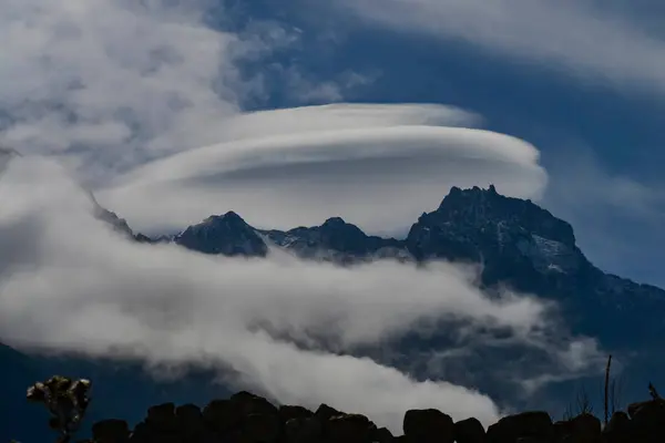 Stock image Lenticular cloud over the Caucasus mountains is one of the most beautiful and rare phenomena, in the village of Verhnya Balkaria,the Republic of Kabardino-Balkaria. Russia.High quality photo