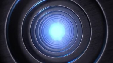 Sonsuz genişleyen metalik dairesel şekillerden oluşan bir tünelde ilerlerken ince mavi bir parıltıyla aydınlanıyor..