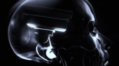 Beynin merkezinde teknolojinin yakında düşüncelerimizi okuyabileceği fikrini tasvir eden bir kamera görüntüsü olan saydam bir insan kafasının yer aldığı biçimlendirilmiş bir sahne..