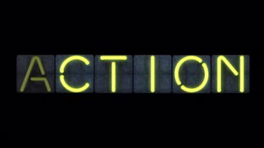 Parlak sarı yanıp sönen neon harfli neon renkli bir 'Action' manşet.. 