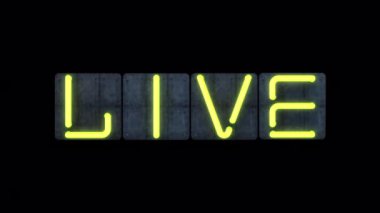 Parlak sarı yanıp sönen cam neon harfli neon renkli bir 'Live' manşet.. 