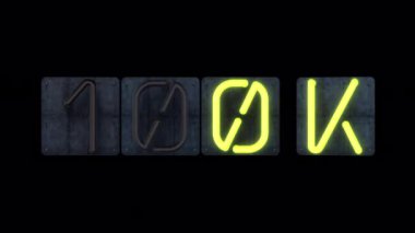 Parlak sarı yanıp sönen parlak cam neon harfli neon renkli bir 100K manşet.. 