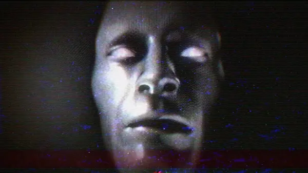 Televizyondaki beyaz gürültü parazitinden, zayıf bir televizyon sinyali ve gürültü efektiyle bir yüz ortaya çıkıyor..