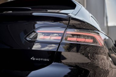 Vinnitsya, Ukraine - 14 July, 2022: Black Volkswagen Arteon R-Line rear LED headlight