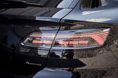 Vinnitsya, Ukraine - 14 July, 2022: Black Volkswagen Arteon R-Line rear LED headlight