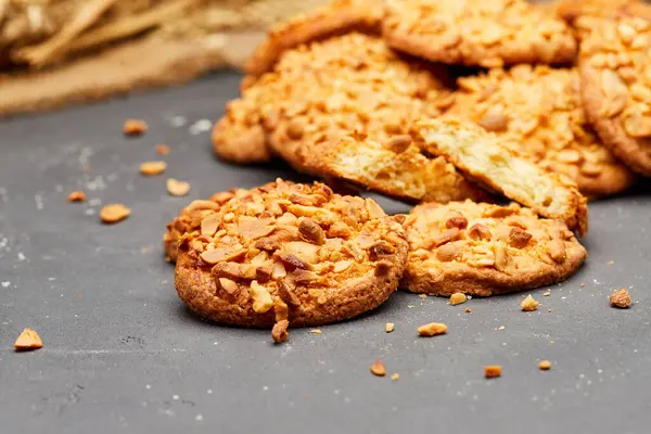 stock image Crunchy peanut cookies with a delicious nutty topping, perfect for a sweet and satisfying snack