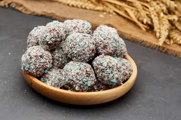 stock image Colorful chocolate truffles with a crunchy coating, perfect for a festive and indulgent treat. High quality photo