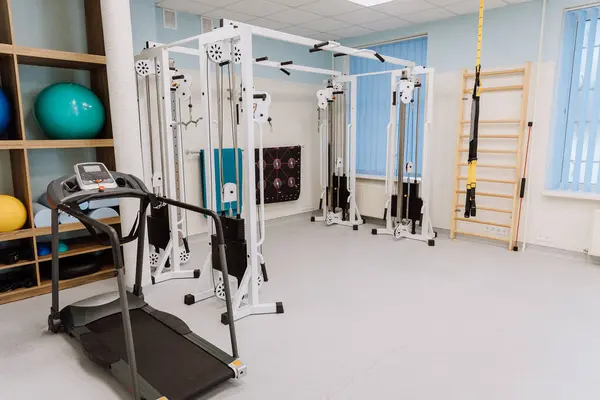 stock image Fitness gym with professional equipment for workouts and physical therapy - perfect for training. High quality photo