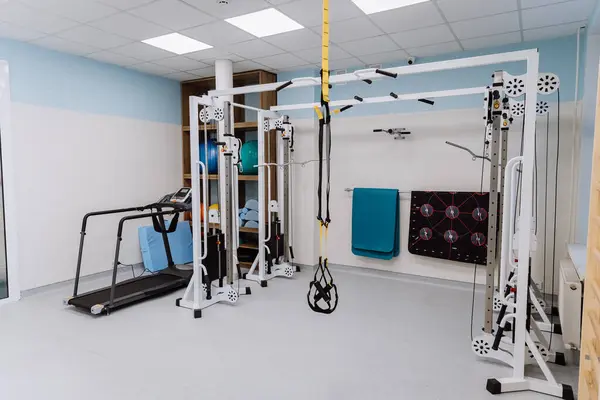 stock image Fitness gym with professional equipment for workouts and physical therapy - perfect for training. High quality photo