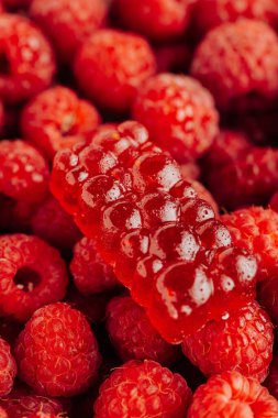 Advertisement of natural raspberry marmalade on fresh raspberries, vibrant color and texture. High quality photo clipart