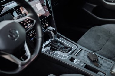 Vinnitsa, Ukraine - January 22, 2024 : Volkswagen Arteon gear shift and console premium interior. High quality photo clipart