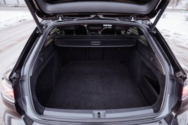 Vinnitsa, Ukraine - January 22, 2024 : Opened trunk view of Volkswagen Arteon showing cargo area. High quality photo clipart