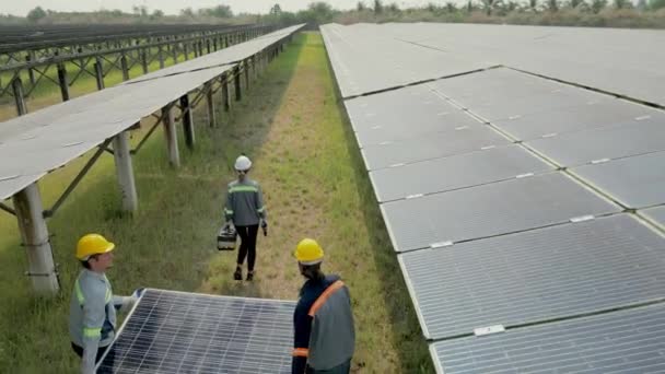 Top View Workers Holding Solar Panels Walking Solar Farm Engineers — Stock Video