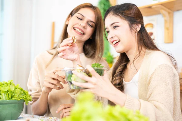 stock image Smiling women preparing fresh healthy salad vegetables. The clean diet food from local products and ingredients. Market fresh.