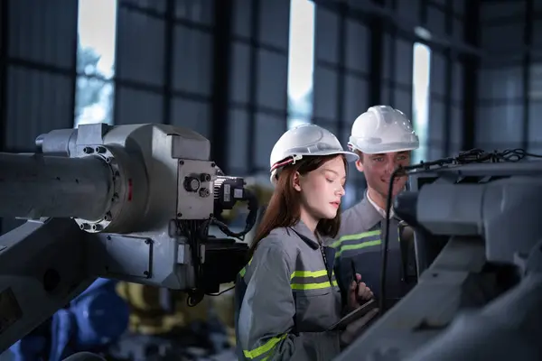 Engineers Check Control Heavy Machine Robot Arm Diverse Team Industrial Stock Image