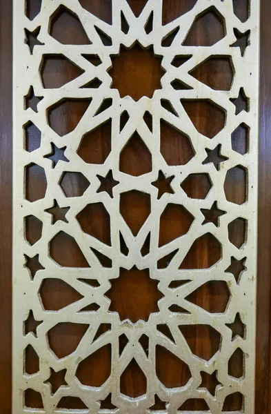 stock image The carved wooden panel in the form of a circular lattice