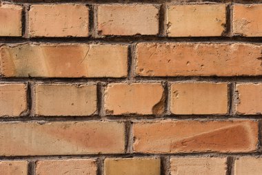 Kırmızı tuğlalı arka plan. Tuğla yakın plan. Kırmızı tuğla duvar arka planı..