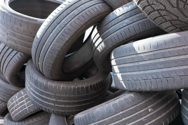 Automobile tire mounting. Warehouse for used tires. A dumpsite of old car tires.