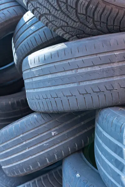 Automobile tire mounting. Warehouse for used tires. A dumpsite of old car tires.
