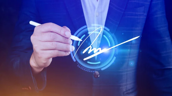 Electronic Signature Concept, Electronic Signing Businessman signs electronic documents on digital documents on virtual screen using stylus pen, Paperless workplace idea.