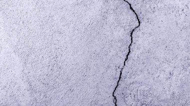Büyük çatlamış beton zemin desenli pis duvar, arka plan için çimento büyük çatlak.