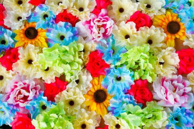 Arkaplan için renkli parlak plastik çiçek dokusu