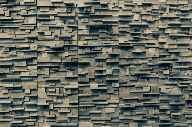 Açığa çıkarılmış ahşap duvar dış yüzeyi, ahşap yama güzel bir parke deseni oluşturur, ahşap duvar deseni, arka plan için.