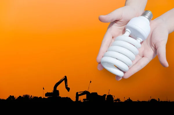 Energy Saving Concept Woman Hand Holding Light Bulb Industry Landscape — Stock Photo, Image