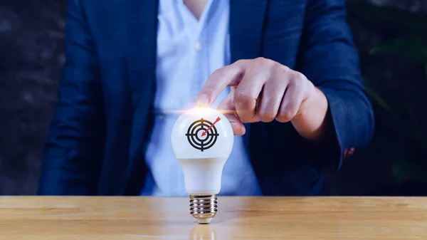 Businessman Holding Light Bulb Concept New Idea Virtual Dartboard Arrow — Stock Photo, Image