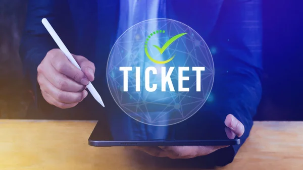 Businessman touching with button Ticket word, Business, Technology, internet and networking concept businessman pressing online booking button on virtual screens.