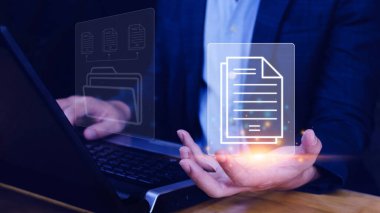 Belge Yönetim Sistemi (DMS) görevdeki dizüstü bilgisayarda çalışan bir bilişim danışmanı. Şirket dosyaları bilgisini arşivlemek, aramak ve yönetmek için yazılım