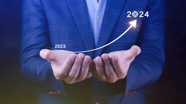 2024 Business Planning, Strategy, creative, Idea concept, Businessman pointing chart graph with 2024 business icon, new setting goal, objective, target, goal, new year\'s resolution, business marketing