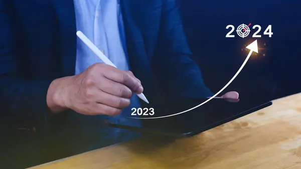 2024 Business Planning, Strategy, creative, Idea concept, Businessman pointing chart graph with 2024 business icon, new setting goal, objective, target, goal, new year\'s resolution, business marketing