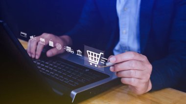 İnternetten alışveriş. Bilgisayarda sanal grafik simgesi diyagramı, ödeme çevrimiçi, dijital pazarlama, iş finansmanı, internet ağı teknolojisi konsepti ile el alışverişi.