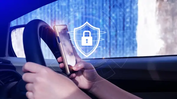 Woman driver holding smartphone with shield protection icon in car, Security shield Lock Security, Protect Concept display, secure and safe your data concept