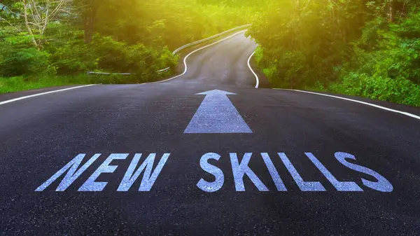 Self development concept and changing skill demand idea, New skills and arrow written on asphalt road, New skills concept.