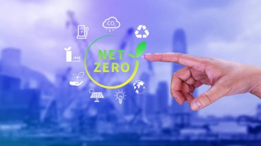 Net Zero and Carbon Neutral Concepts, Net zero greenhouse gas emissions target, Climate neutral long strategy, Businessman holding NetZero icon. clipart