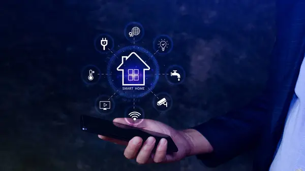 Smart home technology, User touches virtual screen on smartphone manage smart home features including security, lighting, temperature, Smart home and Iot concept.