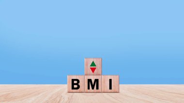 BMI büyük mac indeks sembolü, kavramsal sözcükler BMI büyük mac indeksi ahşap küp, tıp ve vücut kütle indeksi konsepti,.